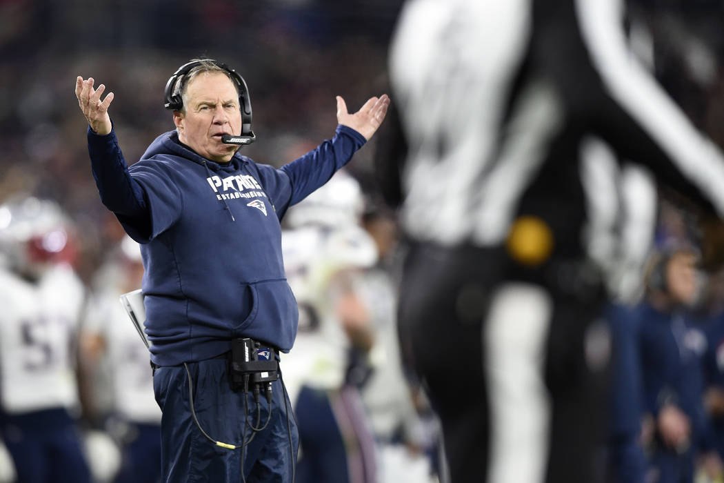 New England Patriots head coach Bill Belichick gestures toward an official during the second ha ...