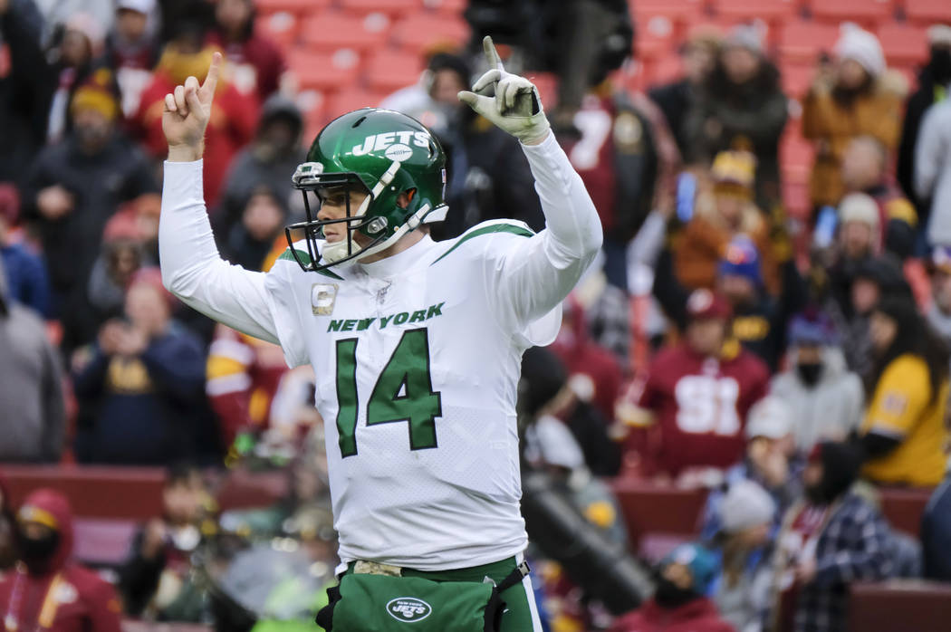 New York Jets quarterback Sam Darnold (14) celebrates a touchdown against the Washington Redski ...