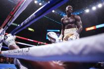Deontay Wilder, top, stands over Luis Ortiz after knocking him down during the seventh round of ...