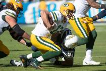 Los Angeles Chargers defensive end Joey Bosa, back, sacks Green Bay Packers quarterback Aaron R ...