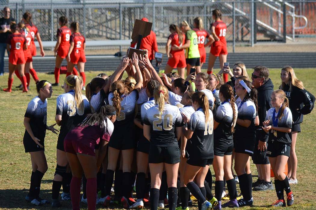 Courtesy photo The Faith Lutheran girls soccer team celebrates the school's first-ever Class 4 ...