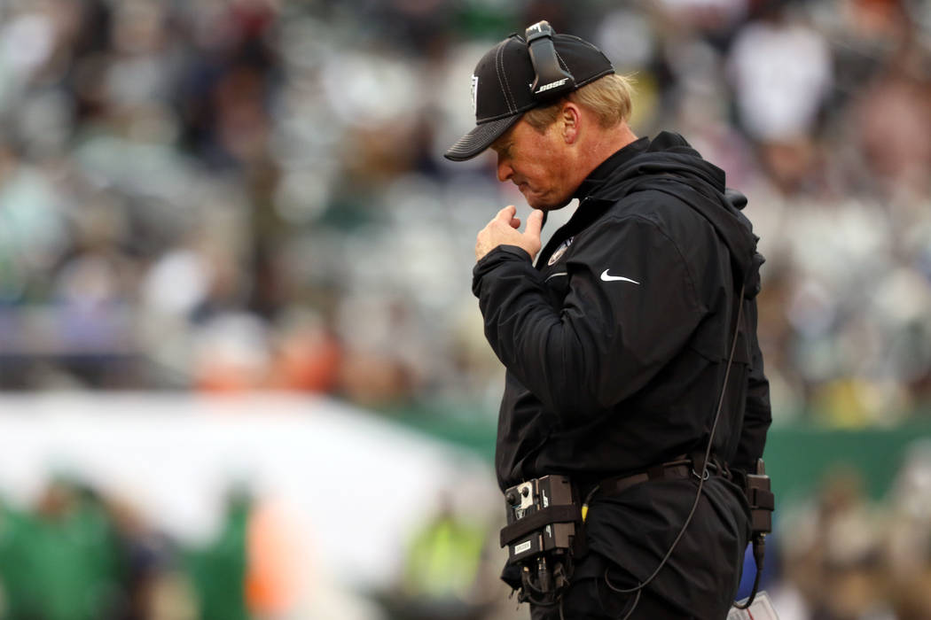 Oakland Raiders head coach Jon Gruden walks on the sideline during the second half of an NFL ga ...