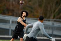 Free agent quarterback Colin Kaepernick participates in a workout for NFL football scouts and m ...