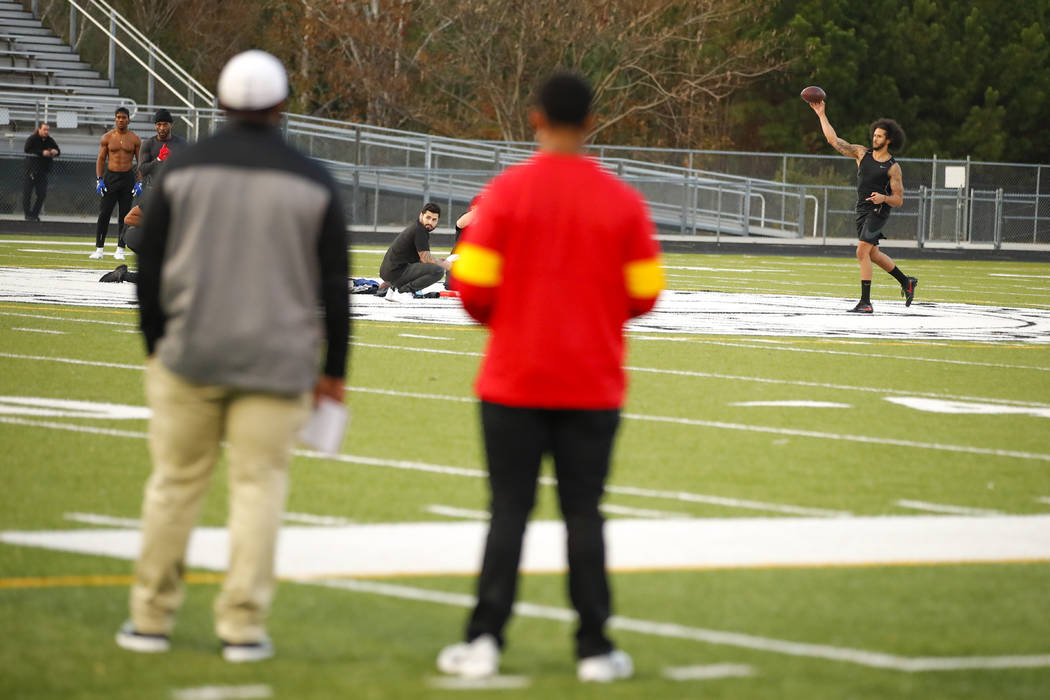 Free agent quarterback Colin Kaepernick participates in a workout for NFL football scouts and m ...