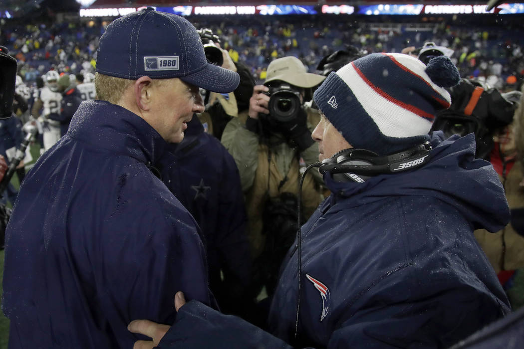 Dallas Cowboys head coach Jason Garrett, left, and New England Patriots head coach Bill Belichi ...