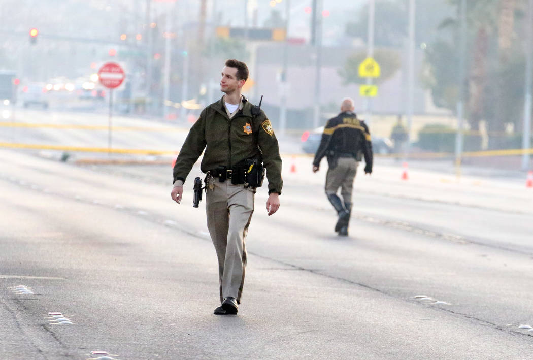 Police are investigating a homicide and vehicle accident at East Lake Mead Boulevard and North ...