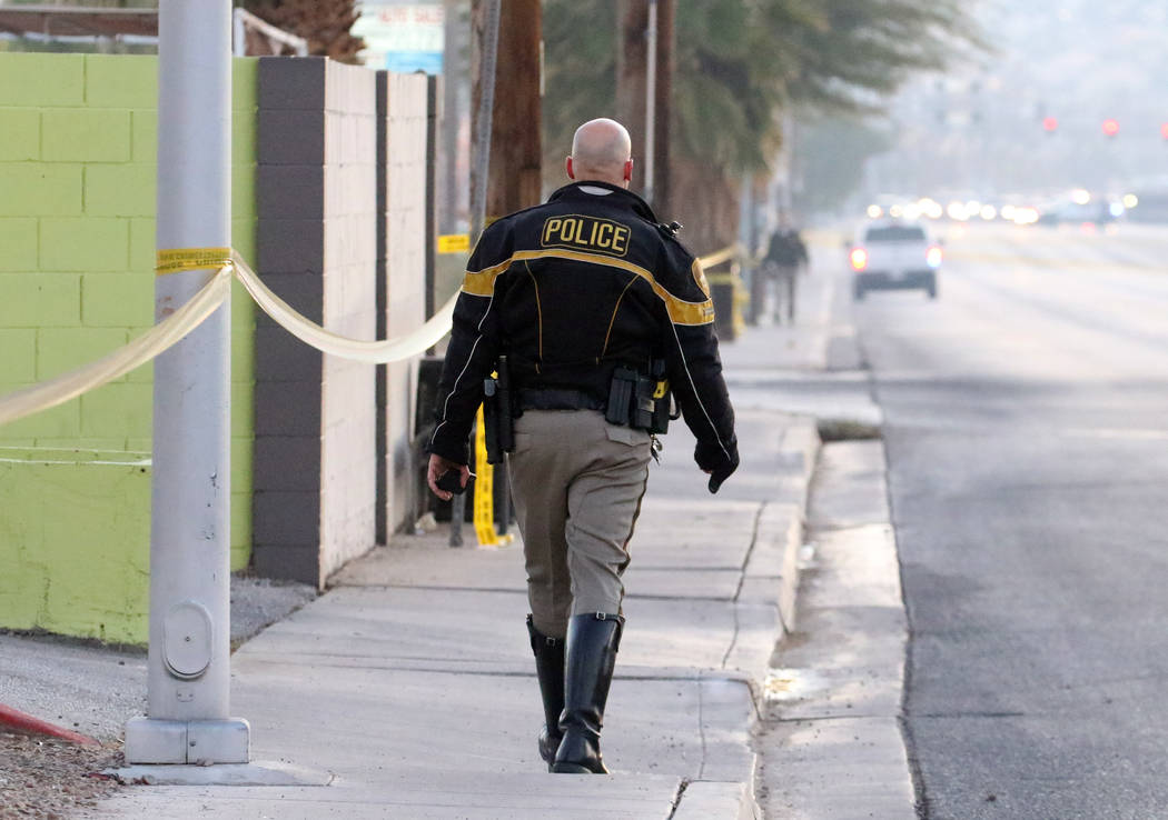 Police are investigating a homicide and vehicle accident at East Lake Mead Boulevard and North ...