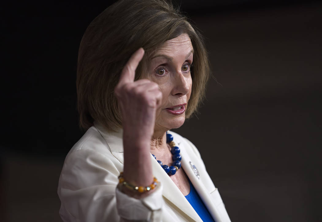 Speaker of the House Nancy Pelosi, D-Calif., talks to reporters as the House Intelligence Commi ...