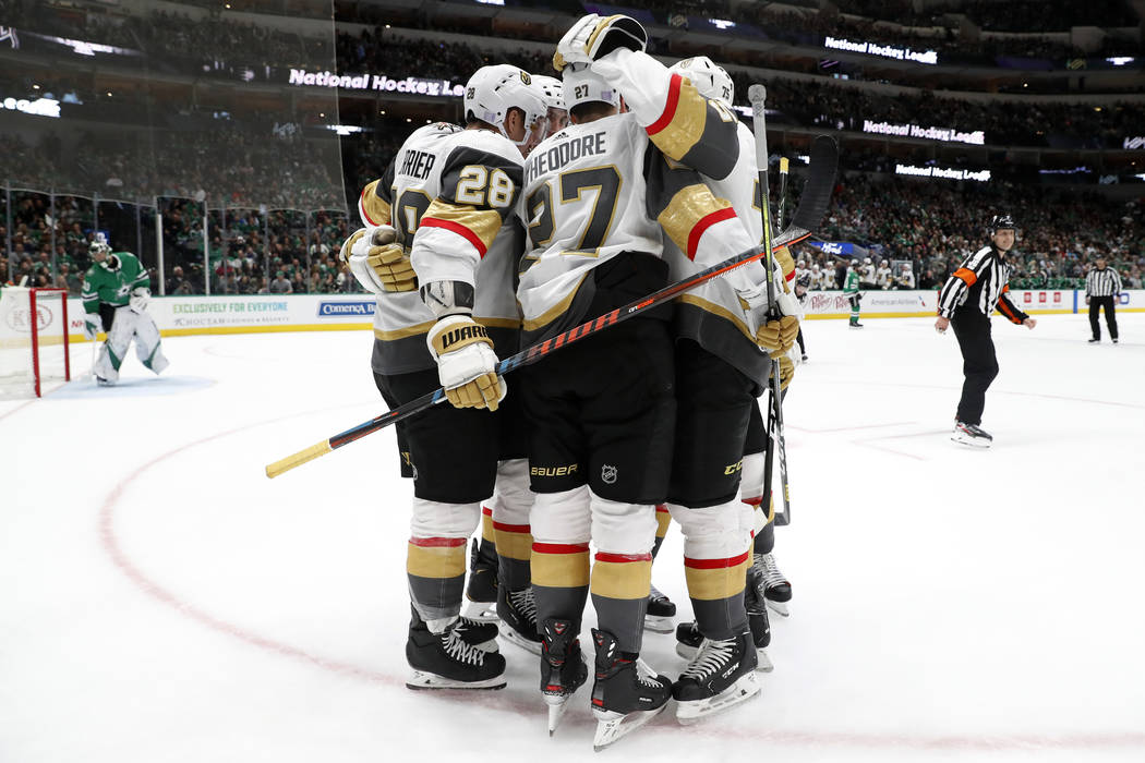 Vegas Golden Knights left wing William Carrier (28) and the rest of the line celebrate with She ...