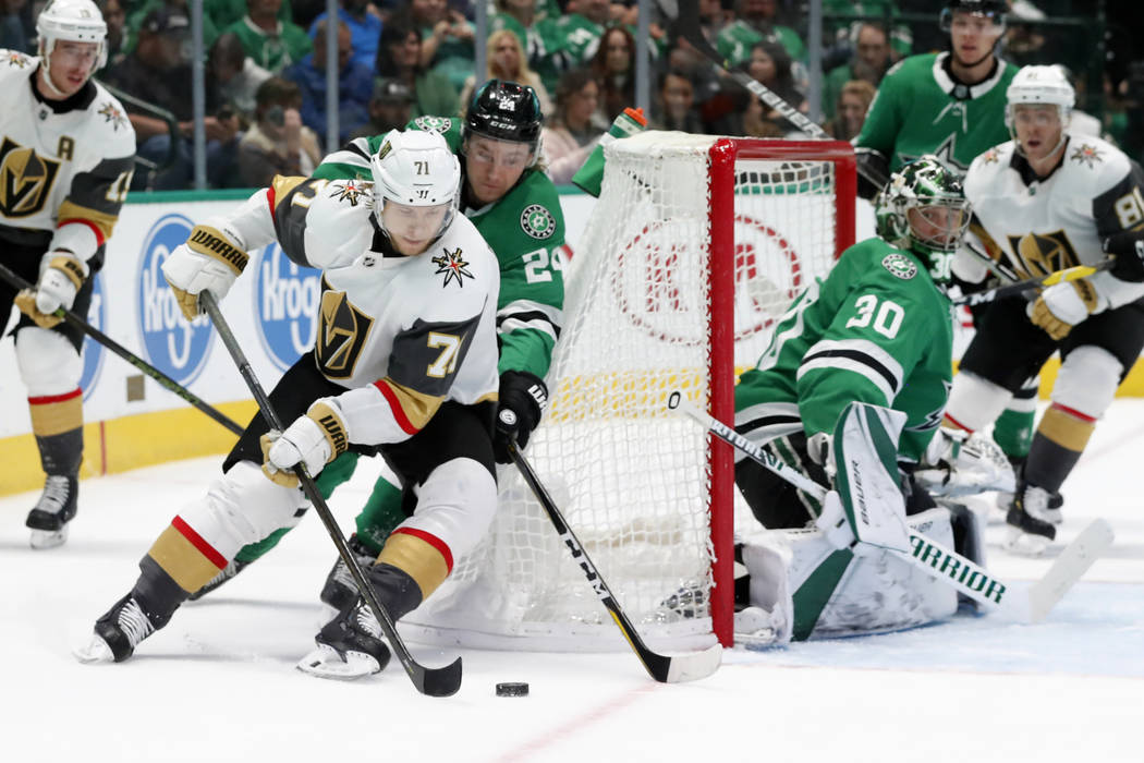 Vegas Golden Knights center William Karlsson (71) attempts to take a shot as Dallas Stars' Roop ...