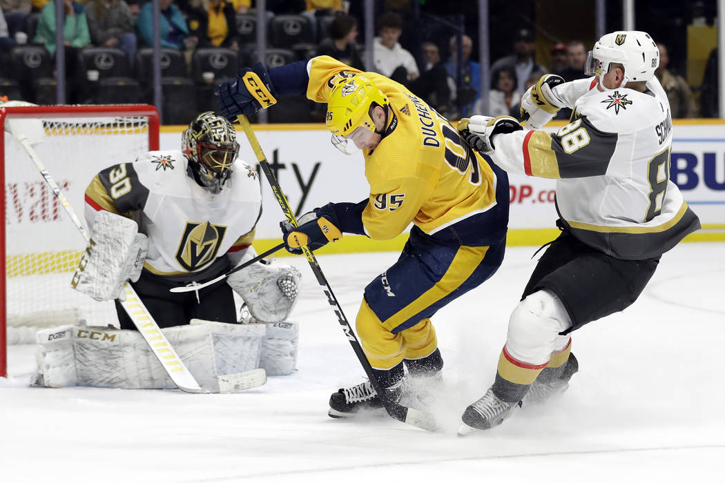 Nashville Predators center Matt Duchene (95) carries the puck between Vegas Golden Knights goal ...