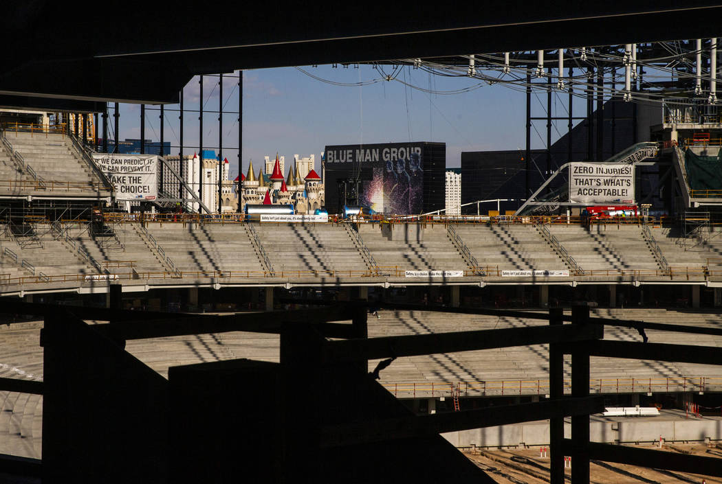The stands with retractable doors beyond reveal a view of the Strip during a tour of the Raider ...