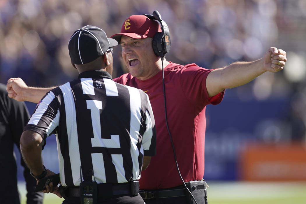Southern California head coach Clay Helton argues with an official in the second half of an NCA ...