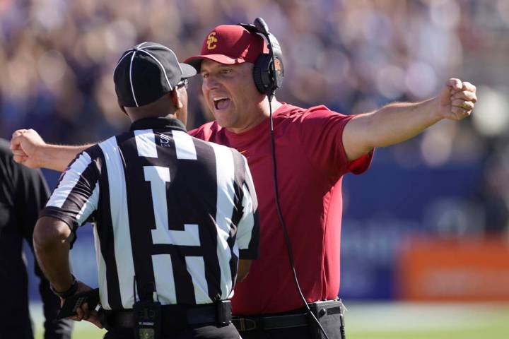 Southern California head coach Clay Helton argues with an official in the second half of an NCA ...