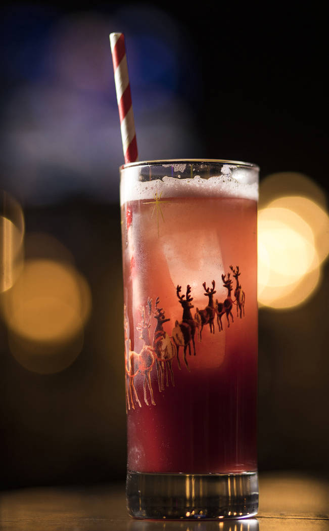 The Run Run Rudolph made of prosecco, London dry gin, mulled wine puree, lemon, and cane syrup, ...