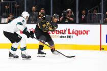 Golden Knights' Max Pacioretty (67) shoots the puck past San Jose Sharks' Dalton Prout (5) duri ...