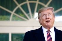 President Donald Trump speaks with members of the press in the Rose Garden of the White House a ...