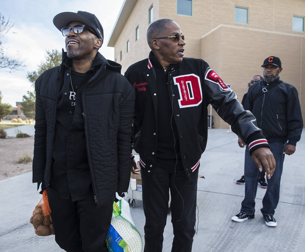 Singer/songwriter Teddy Riley, left, and Clark County Commission Vice Chairman Lawrence Weekly ...