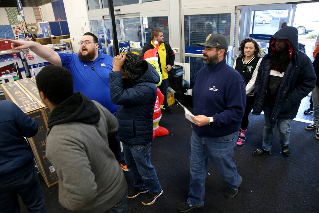 Sales Manager Mike Isbell directs customers at Best Buy at 6455 N. Decatur Blvd. in Las Vegas F ...