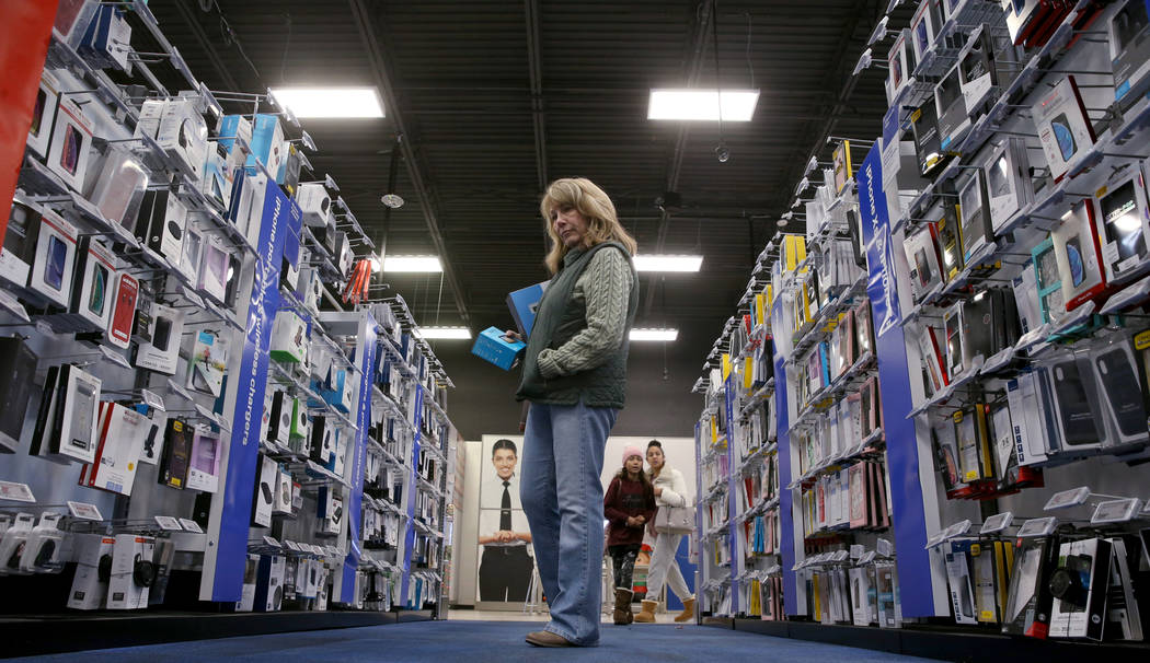 Denise Dessaints of Las Vegas shops at Best Buy at 6455 N. Decatur Blvd. in Las Vegas Friday, N ...