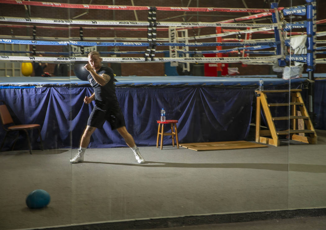 Former two-weight world boxing champion Carl Frampton shadow boxes in a mirror at the Top Rank ...