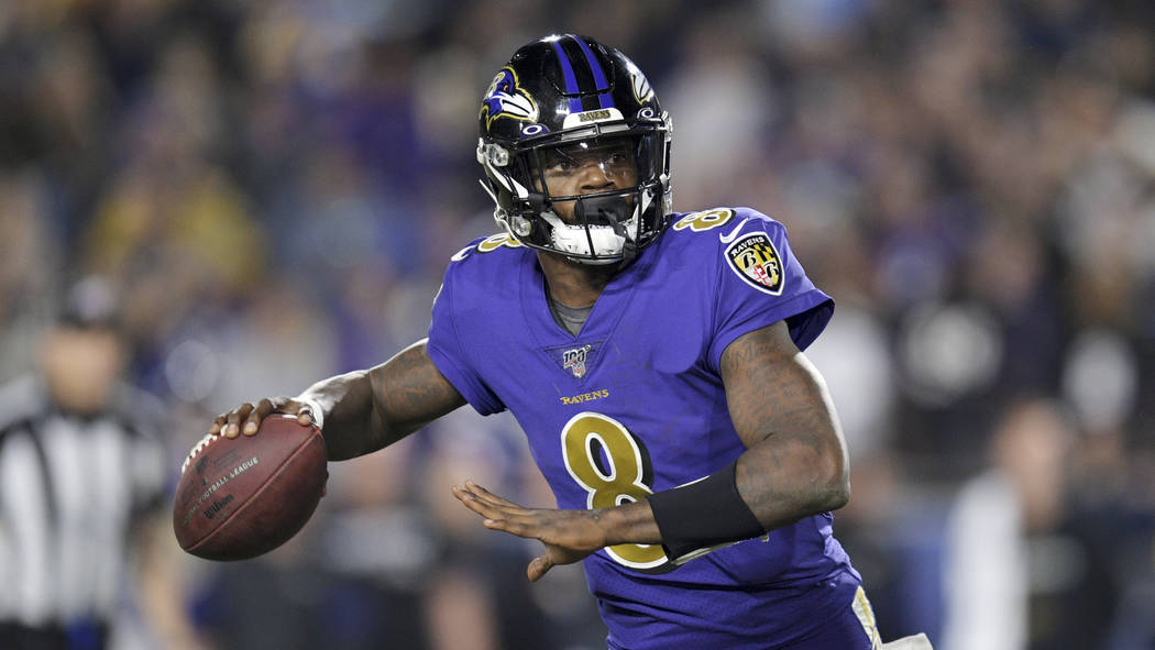 Baltimore Ravens quarterback Lamar Jackson passes against the Los Angeles Rams during the secon ...