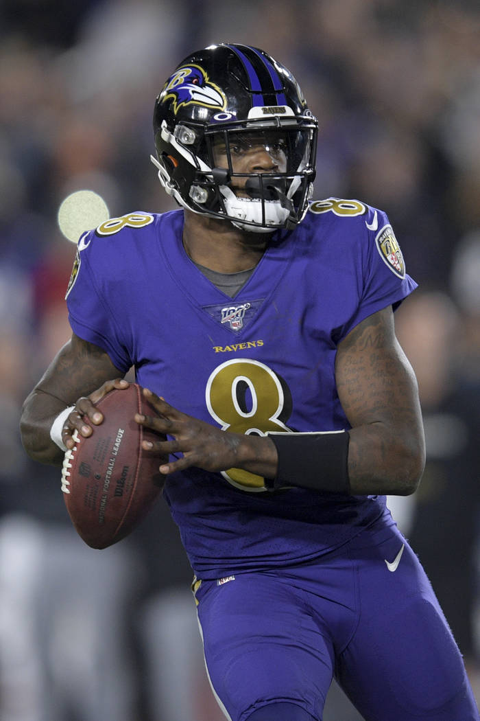 Baltimore Ravens quarterback Lamar Jackson in an NFL football game against the Los Angeles Rams ...