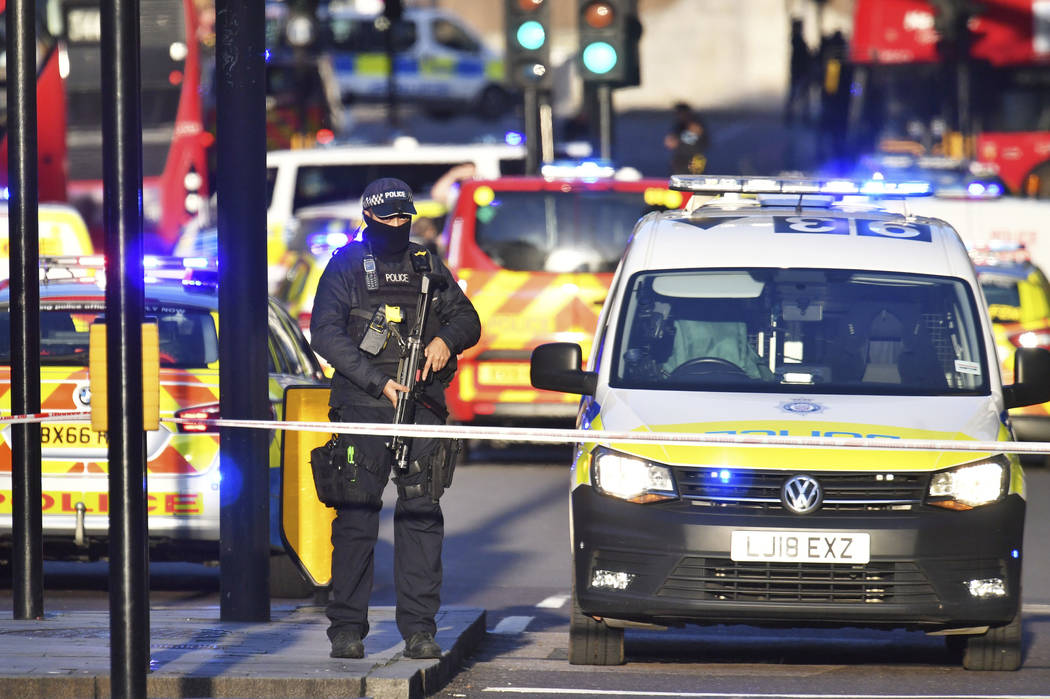 Armed police at the scene of an incident on London Bridge in central London following a police ...