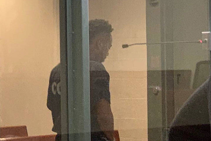 Nathaniel Tavers Postelle III, behind the windows, was in court Friday afternoon, Nov. 29, 2019 ...