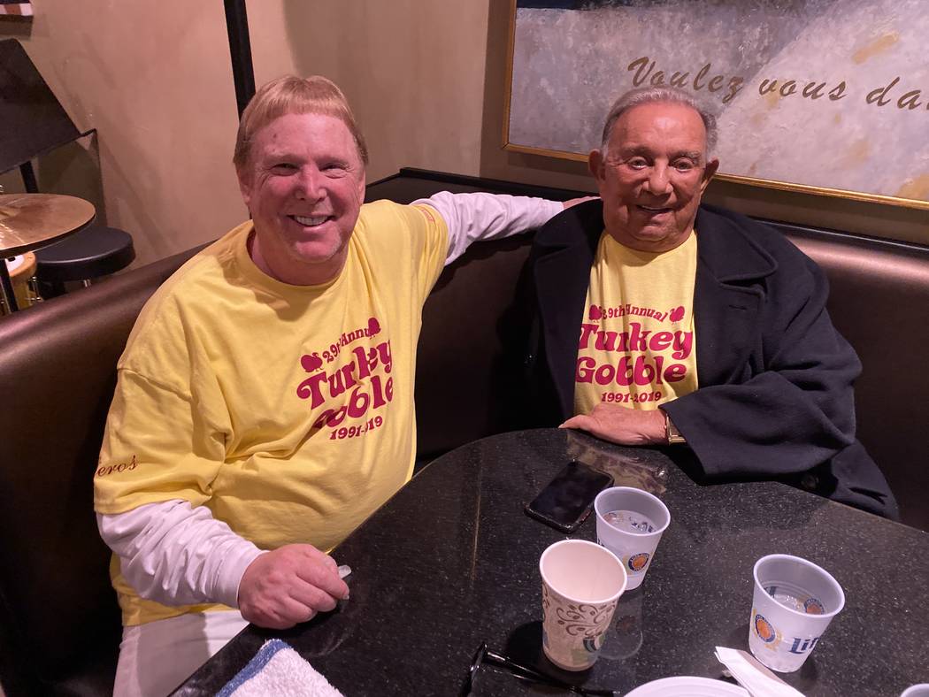 Raiders owner Mark Davis, left, with Piero's Italian Restaurant owner Freddie Glusman, during a ...