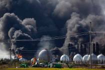 Smoke from an explosion at the TPC Group plant is seen Wednesday, Nov. 27, 2019, in Port Neches ...