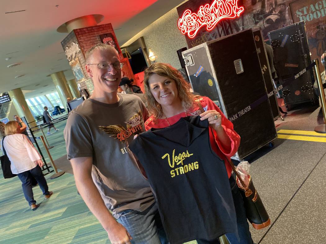 Kris and Barbie Dahl are shown with Steven Tyler's famous Vegas Strong T-shirt at Park Theater ...