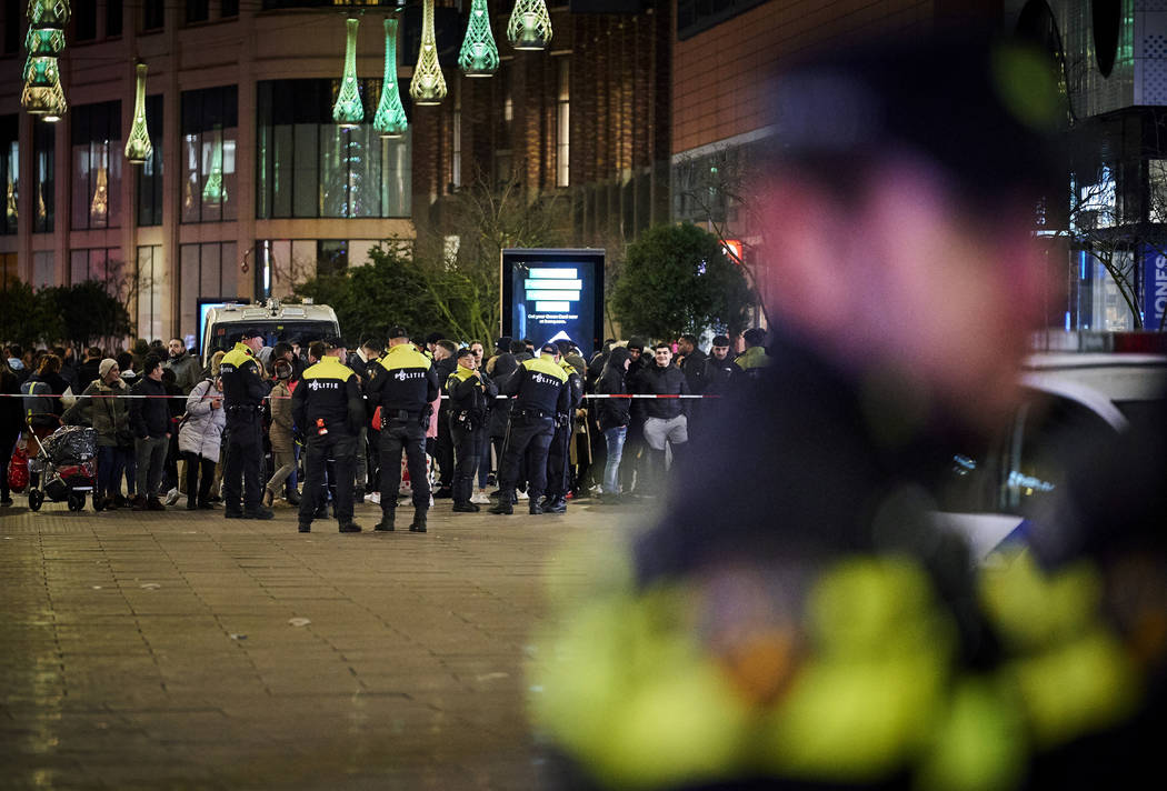 Dutch police secure a shopping street after a stabbing incident in the center of The Hague, Net ...
