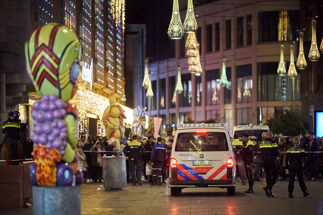 Dutch police block a shopping street after a stabbing incident in the center of The Hague, Neth ...