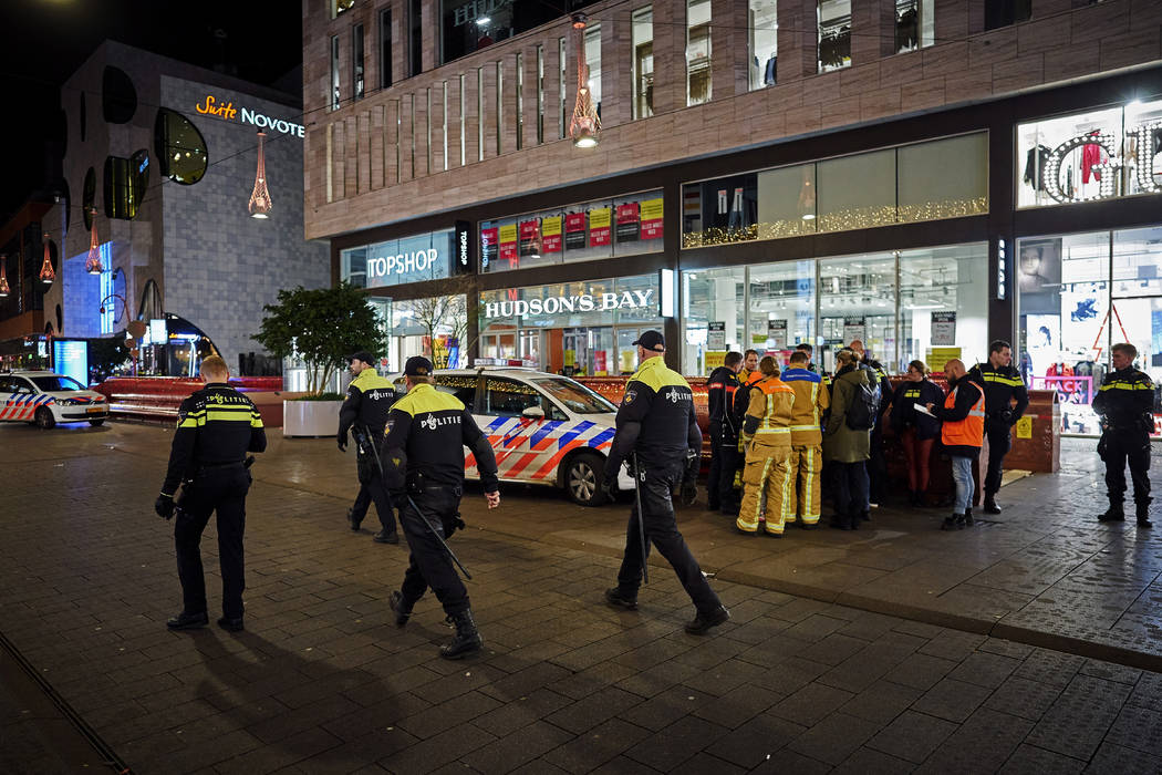 Dutch police secure a shopping street after a stabbing incident occurred in the center of The H ...