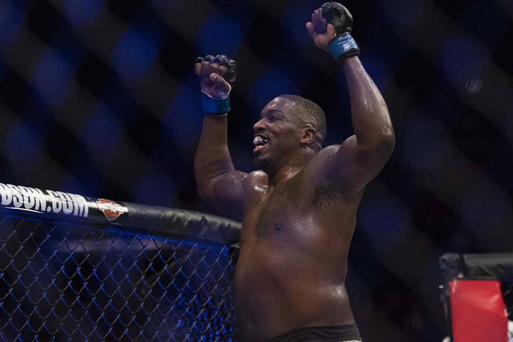 Walt Harris celebrates after defeating Andrei Arlovski in a heavyweight mixed martial arts bout ...