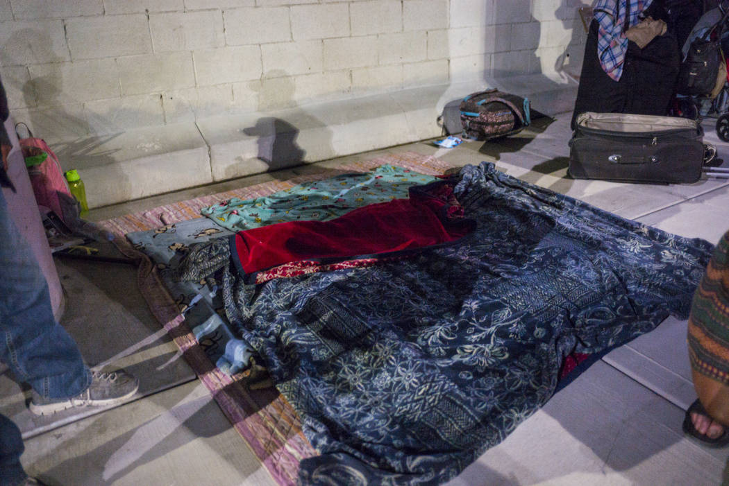 Blankets on the ground as people camp out for the night on Garces Avenue near Main Street in do ...