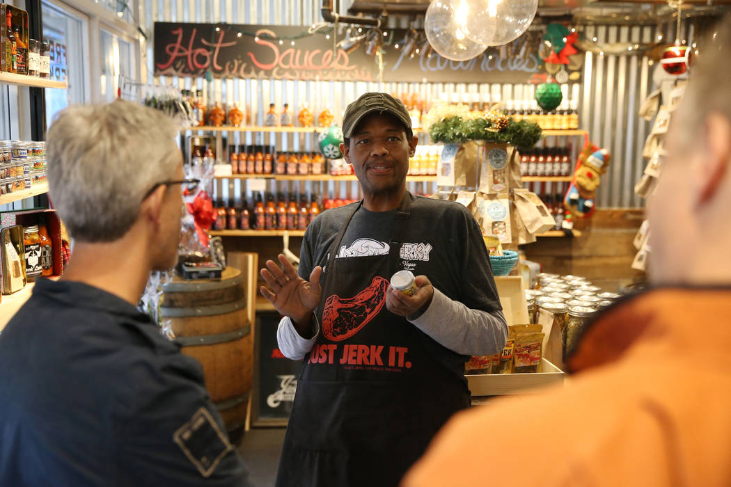 Yarnell Brazelton speaks to customers at Jojo's Jerky inside the Downtown Container Park in Las ...