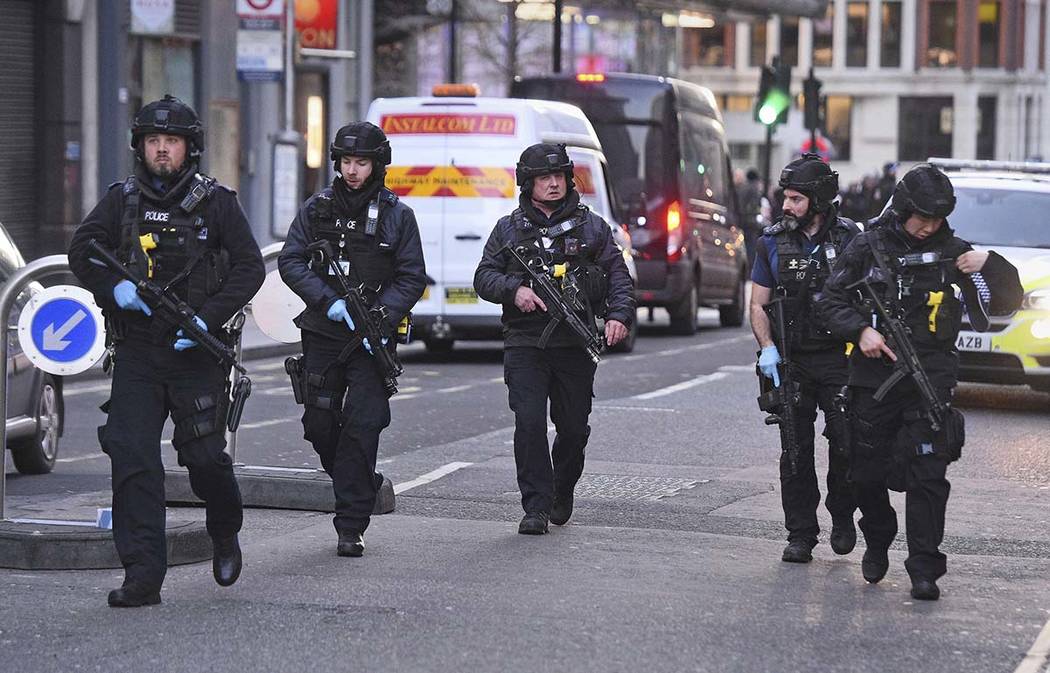 Police on Cannon Street in London near the scene of an incident on London Bridge in central Lon ...
