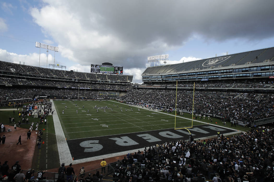 The Tennessee Titans play the Oakland Raiders in an NFL football game in Oakland, Calif., Sunda ...