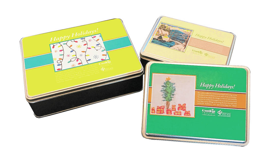 Custom tins with fresh-baked cookies. (Opportunity Village)