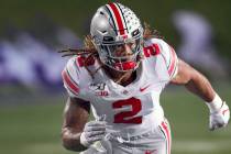 FILE - In this Oct. 18, 2019, file photo, Ohio State defensive end Chase Young rushes against N ...