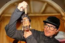 Zak Bagans is shown with his shrunken head during a taping of "Ghost Adventures" at The Golden ...