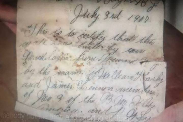 A note dated July 3, 1907, and placed in a beer bottle by two Newark bricklayers was discovered ...