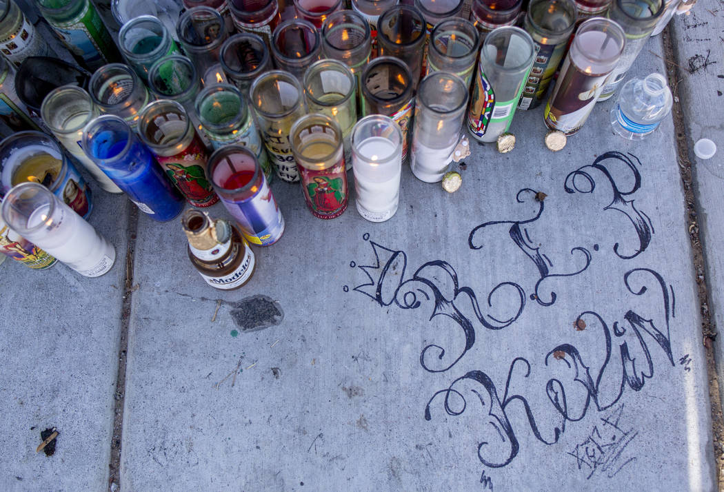 Candles burn at a memorial for Kevin Soriano, 17, of North Las Vegas, who was shot and killed S ...