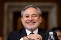 Secretary of Energy nominee Dan Brouillette smiles during a Senate hearing on his nomination, T ...