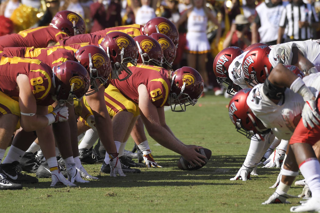 Southern California long snapper Jake Olson (61), who is blind, gets set for a point-attempt du ...