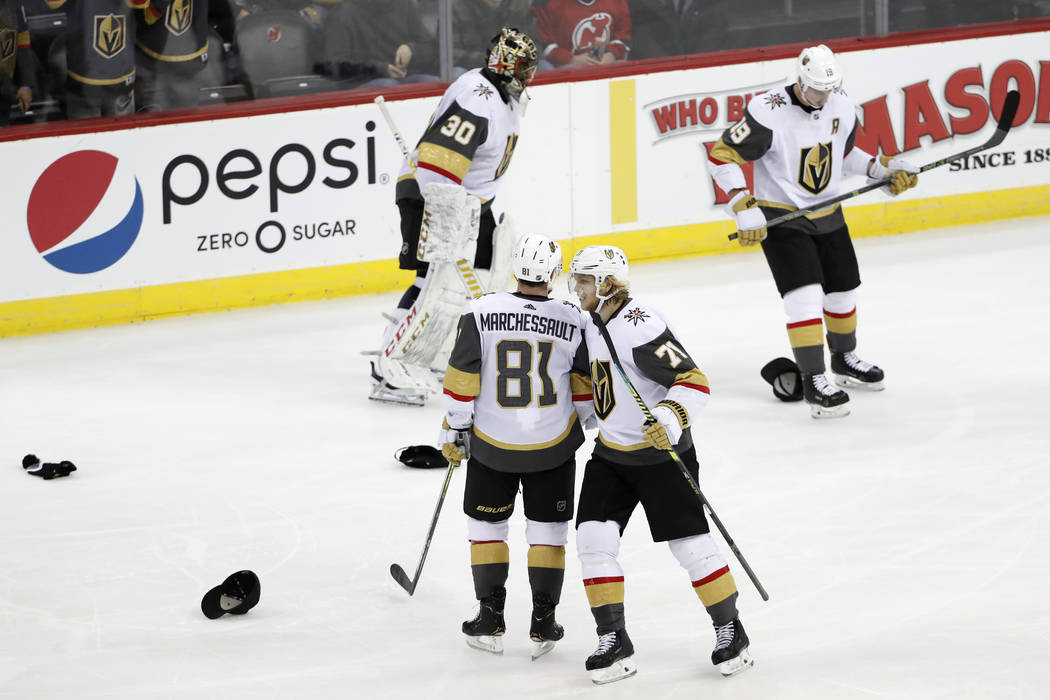 Vegas Golden Knights center William Karlsson (71) congratulates center Jonathan Marchessault (8 ...