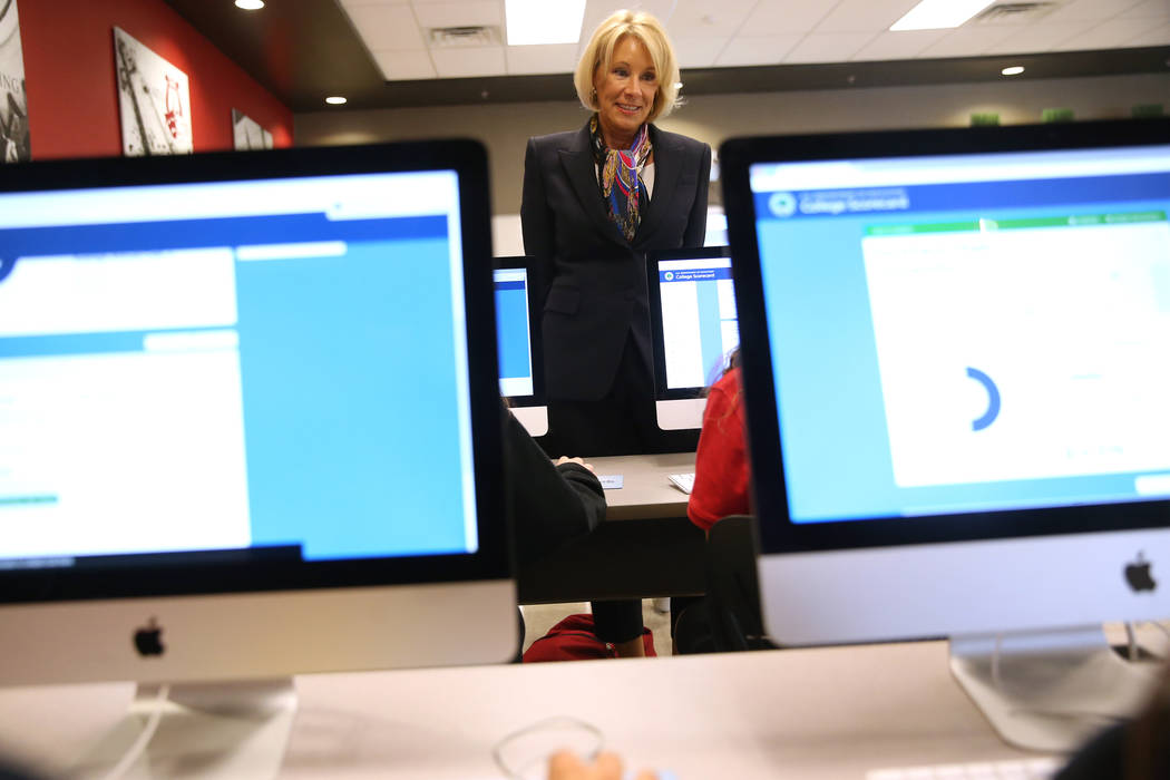 Secretary of Education Betsy DeVos speaks to students during a visit to Pinecrest Academy&#x573 ...