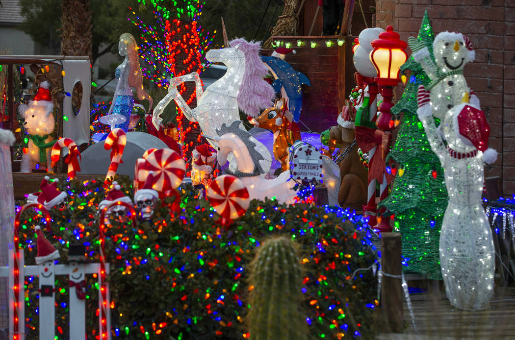 A collection of the holiday lights in the yard of Maria Acosta and Juan Torres which will be fe ...